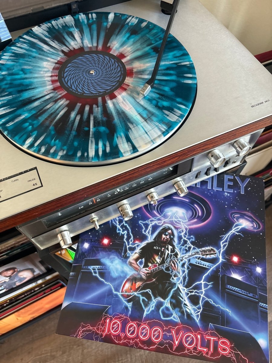 Ace Frehley - 10,000 Volts (IEX) Color In Color - Clear with Red, Blue & Silver Splatter Vinyl - BeatRelease